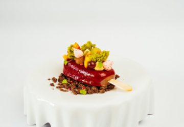 Ice cream stick on a bar with local fruits