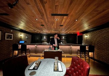 Andrew Merinoff, Great Jones Distilling Co. project manager, stands inside the distillery's speakeasy in New York