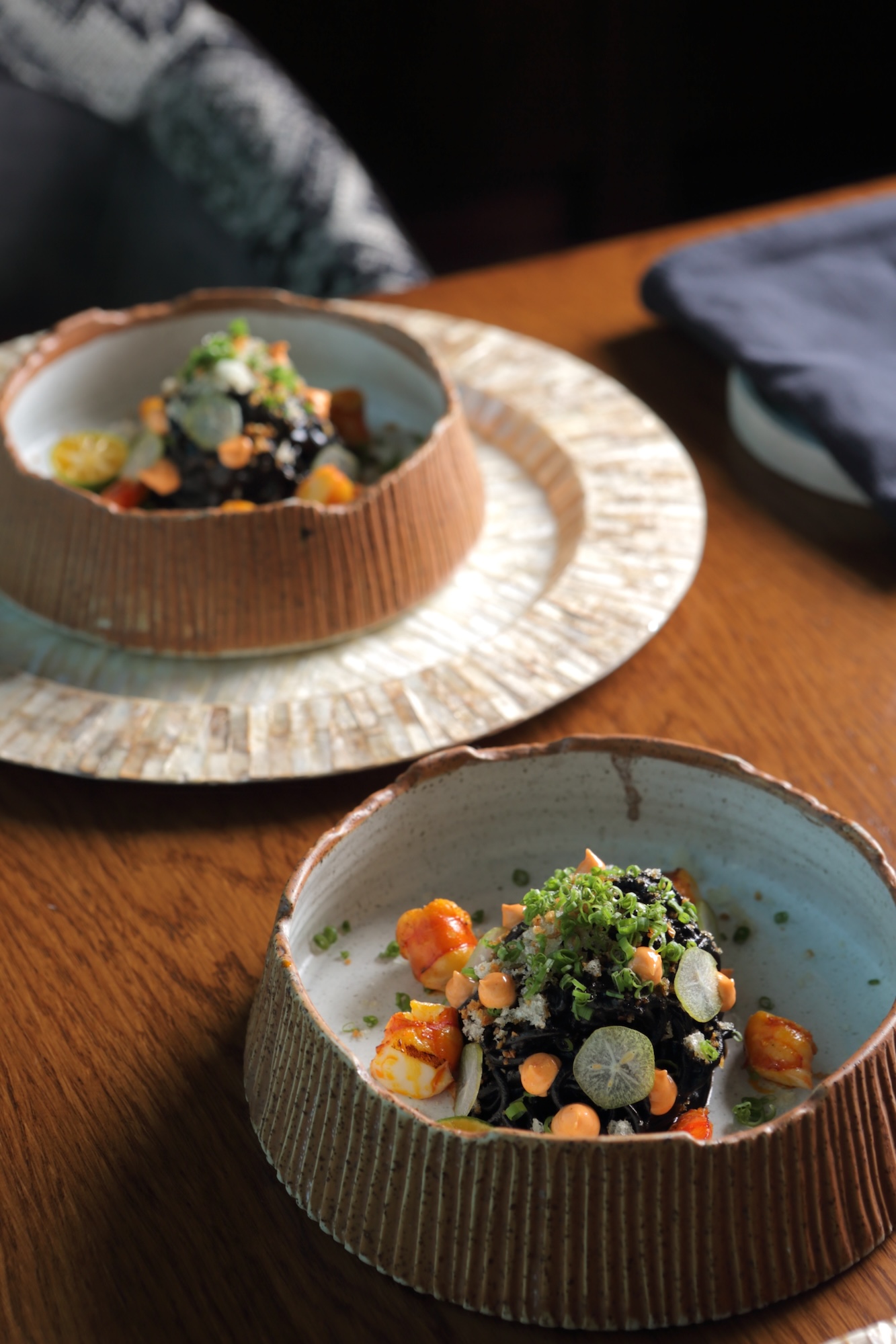 From the Ayà menu: Pansit negra (Hand-made squid ink pansit egg noodles, adobo negra sauce, chicharon, taba ng talangka aioli)
